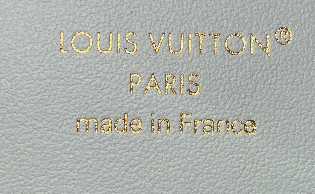 LV Vertical Wallet Taurillion Leather Compact - Image 7