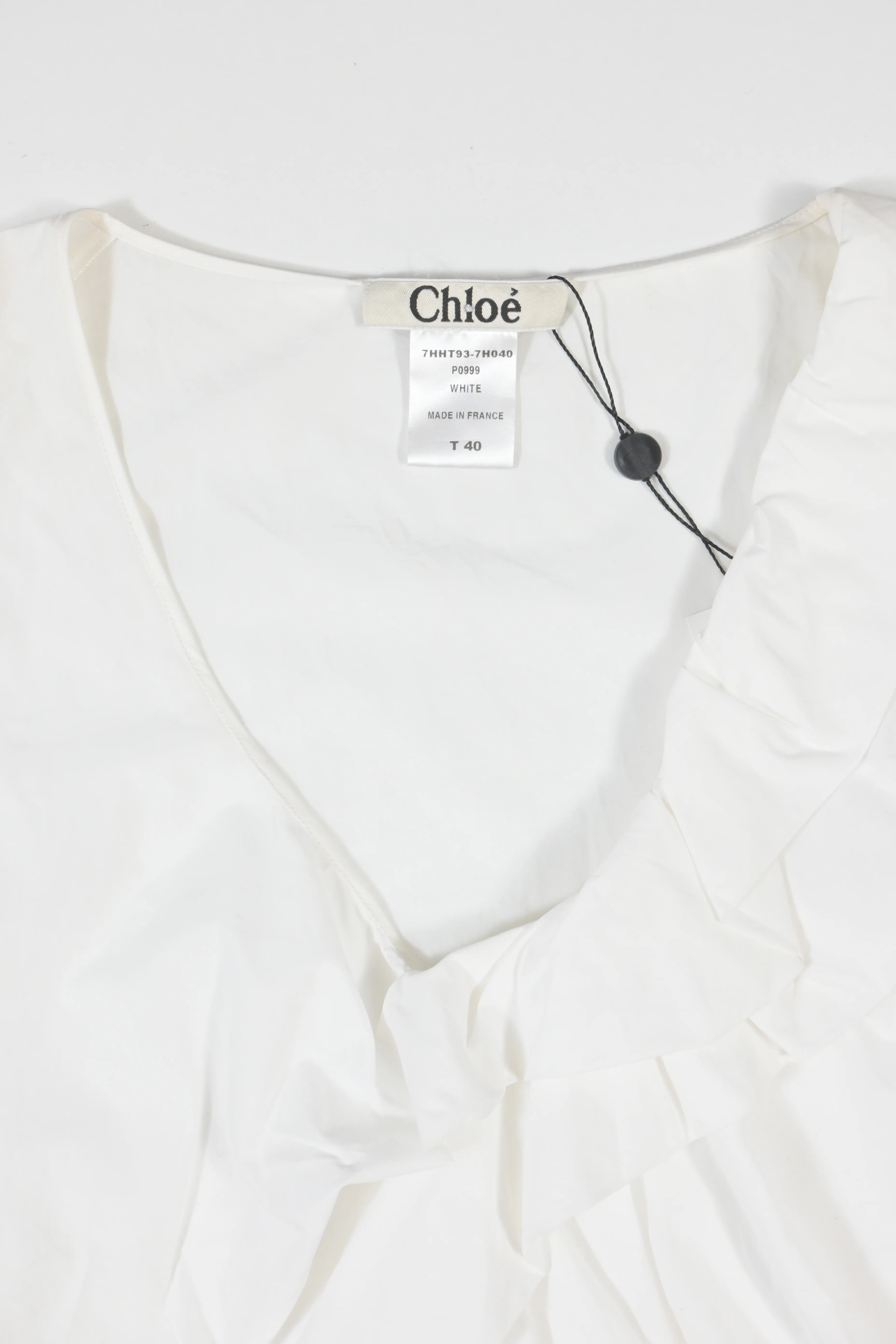 Women's Chloe Sleeveless Ruffled Top in White Cotton - Image 9