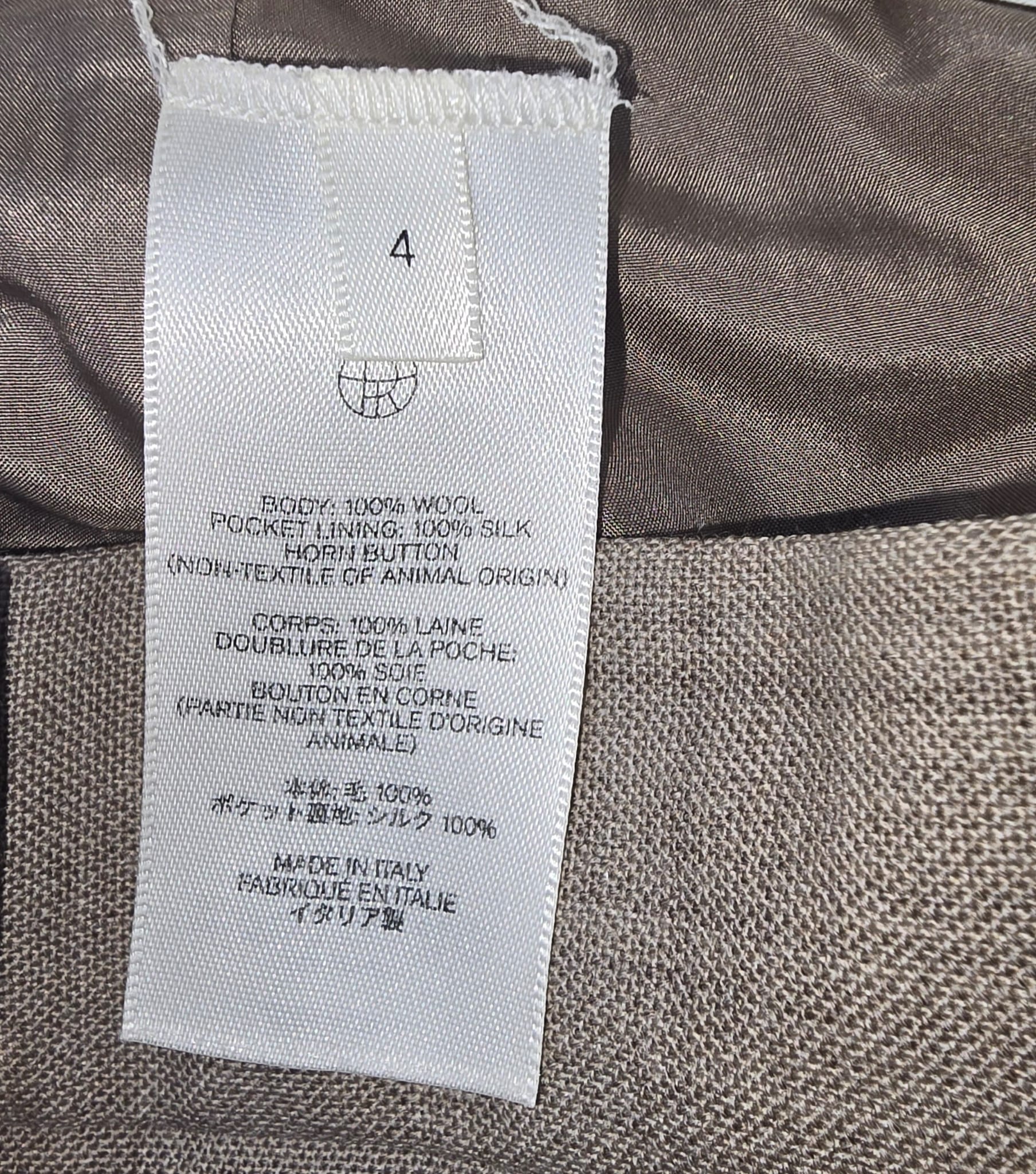 Women's The Row High-Rise Flared Trousers in Beige Wool - Image 9