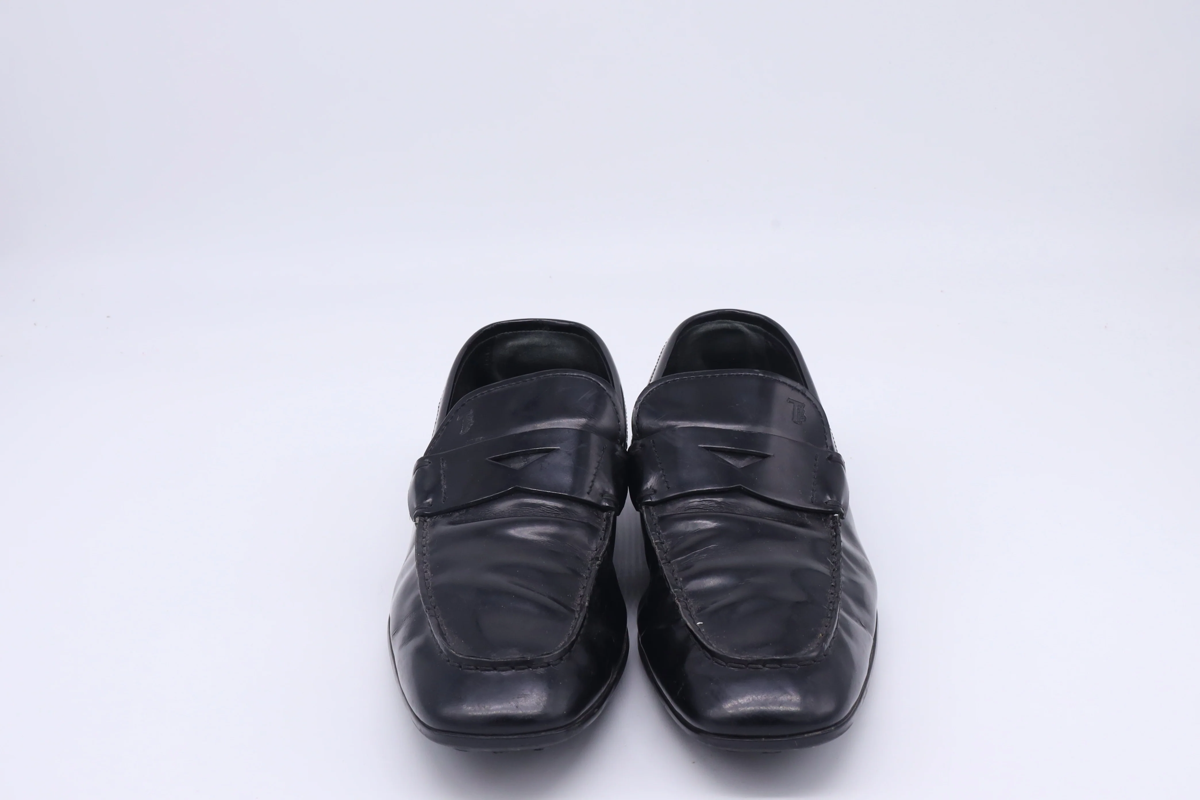 Men's Tod's Logo-Embossed Penny Loafers in Black Leather - Image 9